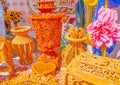 The wooden carved samovar, plate, vase and other kitchenware on the showcase of craftsmen`s stall on Fair due Independence Day
