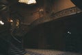 Wooden, carved stairs. Hall of the ancient palace. House of scientists in Lviv. Nice interior Royalty Free Stock Photo