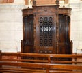 Wooden carved window of the confessional in the Church Royalty Free Stock Photo