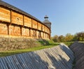 An old wooden fortress with high walls and a water ditch Royalty Free Stock Photo