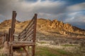 Wooden cattle loading ramp sits on the shady side of the hills Royalty Free Stock Photo