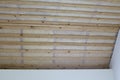 Wooden ceiling lathing. Insulation and ceiling lathing