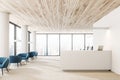 Wooden ceiling office reception hall, armchairs