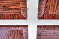 Wooden ceiling panels. Rosewood fineline veneer ceiling panels in the modern office Royalty Free Stock Photo