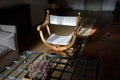 Wooden chair with curved backrest placed in a sunlit room