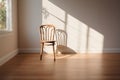 Wooden chair in empty sunny room Royalty Free Stock Photo