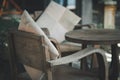 Wooden chair and pillow at outdoor cafe Royalty Free Stock Photo