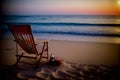 A Wooden Chair Sitting On Top Of A Sandy Beach. Generative AI Royalty Free Stock Photo