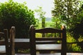 wooden chair table on cozy terrace with garden view Royalty Free Stock Photo