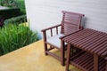 Wooden chair on yellow cement floor with mortar wall Royalty Free Stock Photo