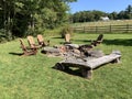 Outdoor campfire setting during the day.