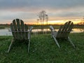 retirement and two chairs looking at the sunset in the swamp Royalty Free Stock Photo