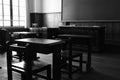 Wooden chairs in an old classroom