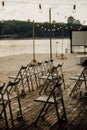 Wooden chairs party pier river concert fan zone