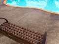 Wooden chairs Beside the pool Royalty Free Stock Photo