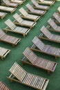 Wooden chairs on pool Royalty Free Stock Photo