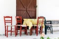 Wooden chairs and tables at traditional Greek tavern Royalty Free Stock Photo