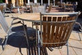 Wooden chairs and wooden circle table in beach cafe Royalty Free Stock Photo