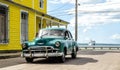 Wooden chalet, cuise ship and american classic car, Cienfuegos,