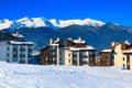 Houses and snow mountains panorama in Bansko, Bulgaria Royalty Free Stock Photo