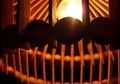 Wooden chandelier in a dark room.