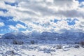 Wooden chapel in a snowy forest. Winter north.Winter in mountain village. Royalty Free Stock Photo