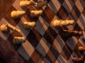 Wooden chess board with wooden pieces with sunlight Royalty Free Stock Photo