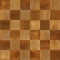 Wooden chess board stacked for seamless background Royalty Free Stock Photo