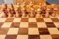 Wooden chess boards and chess pieces with typical Balinese carvings.