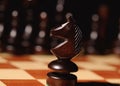 wooden chess pieces. Black horse Royalty Free Stock Photo