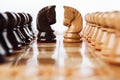 Wooden chess pieces knights on the chessboard Royalty Free Stock Photo