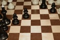 Wooden chessboard with black chessmen as a hobby concept Royalty Free Stock Photo