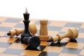 Wooden chessboard with several chessmen Royalty Free Stock Photo