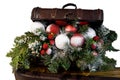 Wooden chest with Christmas gifts. Christmas treasure chest with a Christmas branch. Vintage chest over fir-tree branches