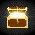 Wooden chest with gold fittings and glowing treasure inside Royalty Free Stock Photo