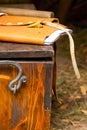 Wooden chest old weathered iron pens folder cards storage of documents military ancient safe Royalty Free Stock Photo