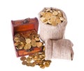 Wooden chest and two bags filled with coins Royalty Free Stock Photo