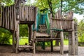 Wooden Childrens Playground. Empty Modern Wooden Children Playground Set On Green Yard In Public Park In Summer Day Royalty Free Stock Photo