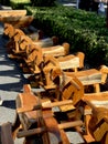 Wooden children`s rocking horses arranged neatly for sale. Royalty Free Stock Photo