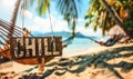 Wooden CHILL sign hanging on a hammock between palm trees on a tropical beach with a serene ocean view, epitomizing