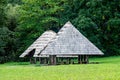 Wooden chips-covered arbor in a recreation area in the forest Royalty Free Stock Photo