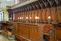 the wooden choir stalls or quire in a cathedral Royalty Free Stock Photo