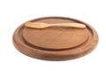 wooden chopping board. shape circular. and fork isolated on whit Royalty Free Stock Photo