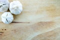 Wooden Chopping Board with Three Garlics