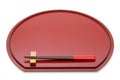 Wooden chopsticks on red lacquer tray Royalty Free Stock Photo