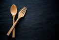 Wooden Chopsticks Spoon Set on a black background,Top view Royalty Free Stock Photo