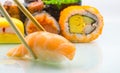 Wooden chopsticks Sushi sticks Japanese food Salmon roll Various views of Rainbow Sushi, Sushi Rolls, Umaki Sushi, Hosomaki Royalty Free Stock Photo