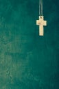 Cross on royal green wall background Royalty Free Stock Photo