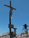 Wooden Christian Cross and Italian Dolomites Alps in Background