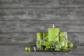 Wooden christmas or advent background with green decoration, can